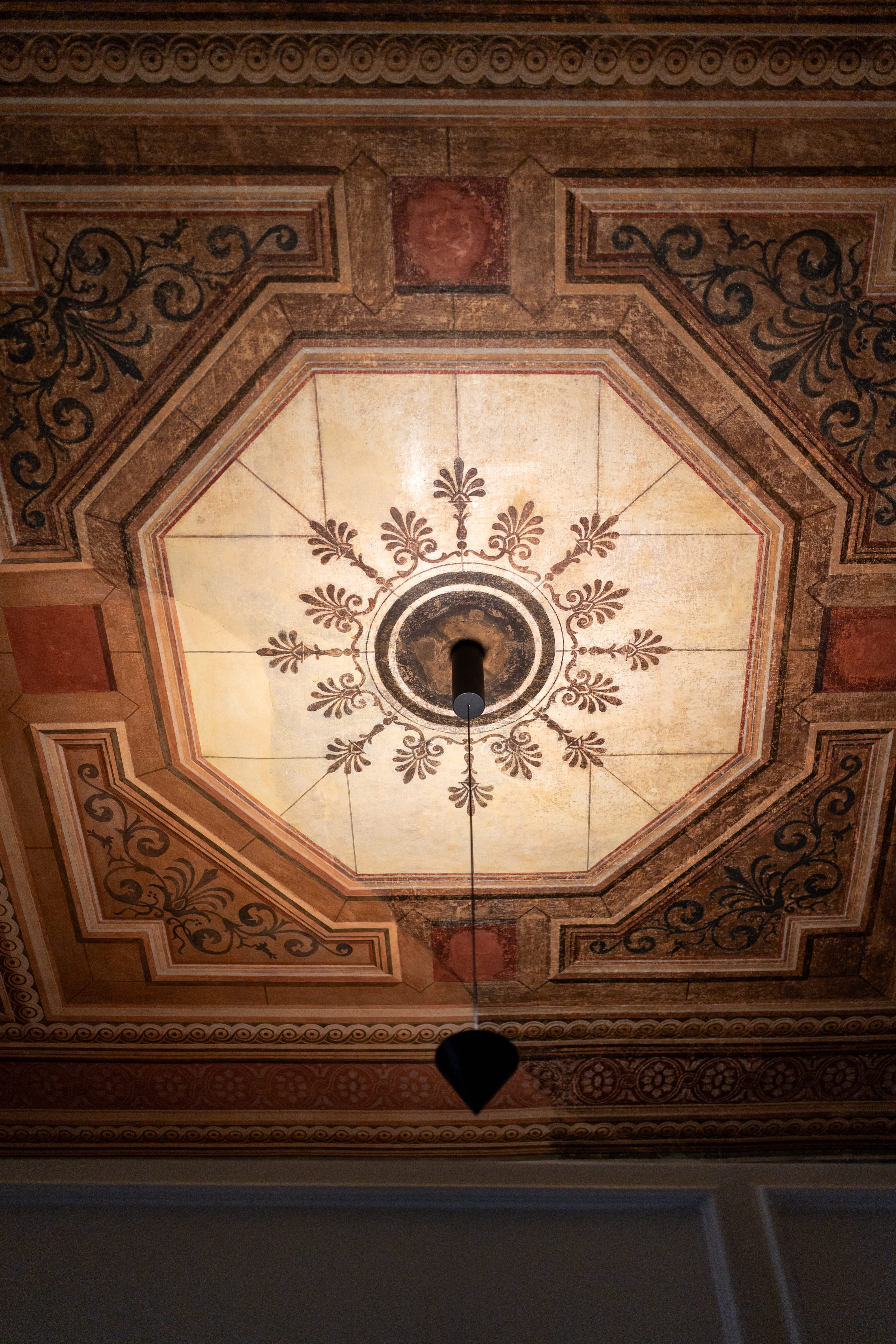 a ceiling with a light fixture