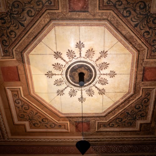 a ceiling with a light fixture