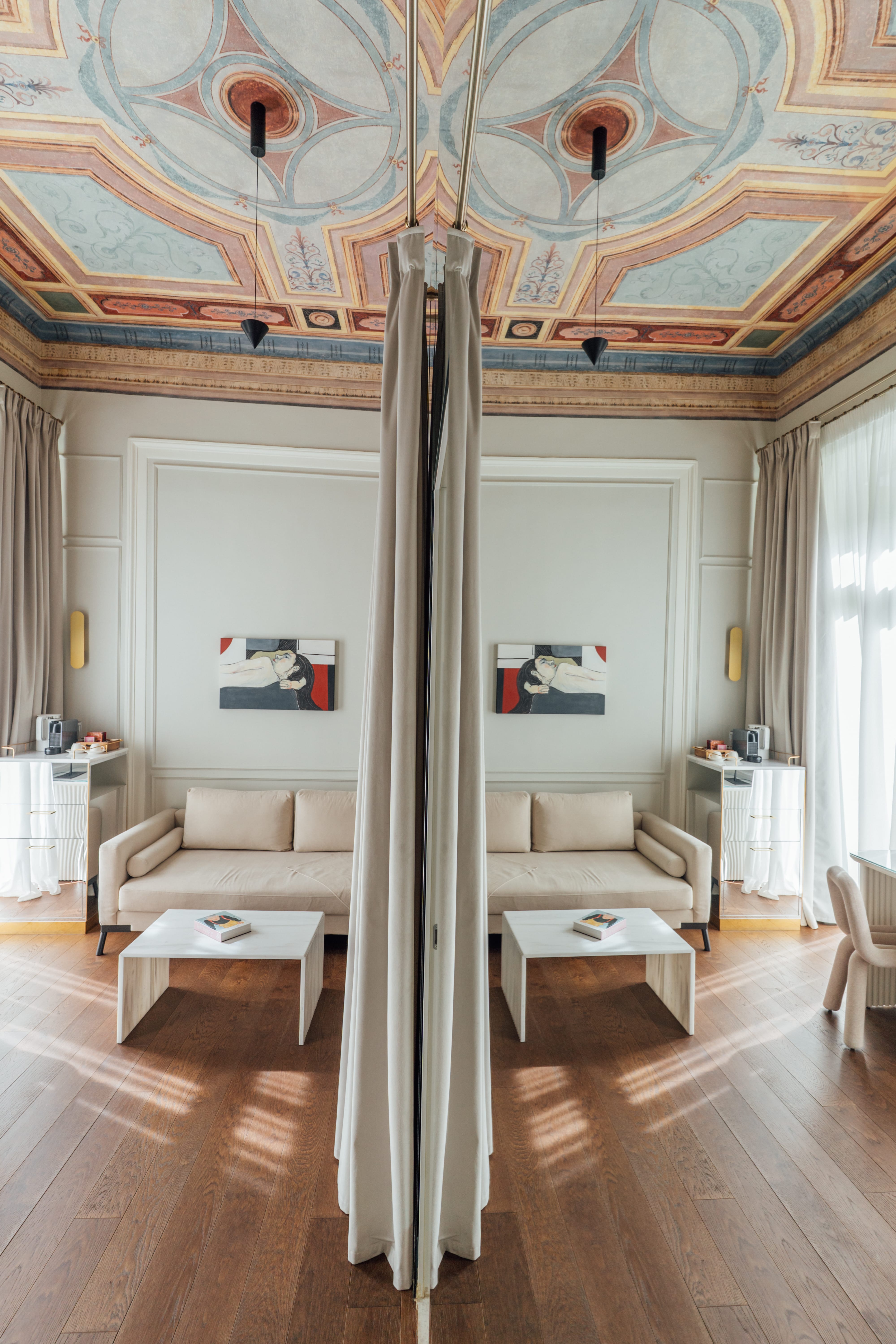 a room with a ceiling with a tree in it
