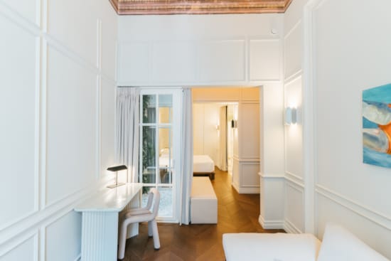 a room with white walls and a wood floor