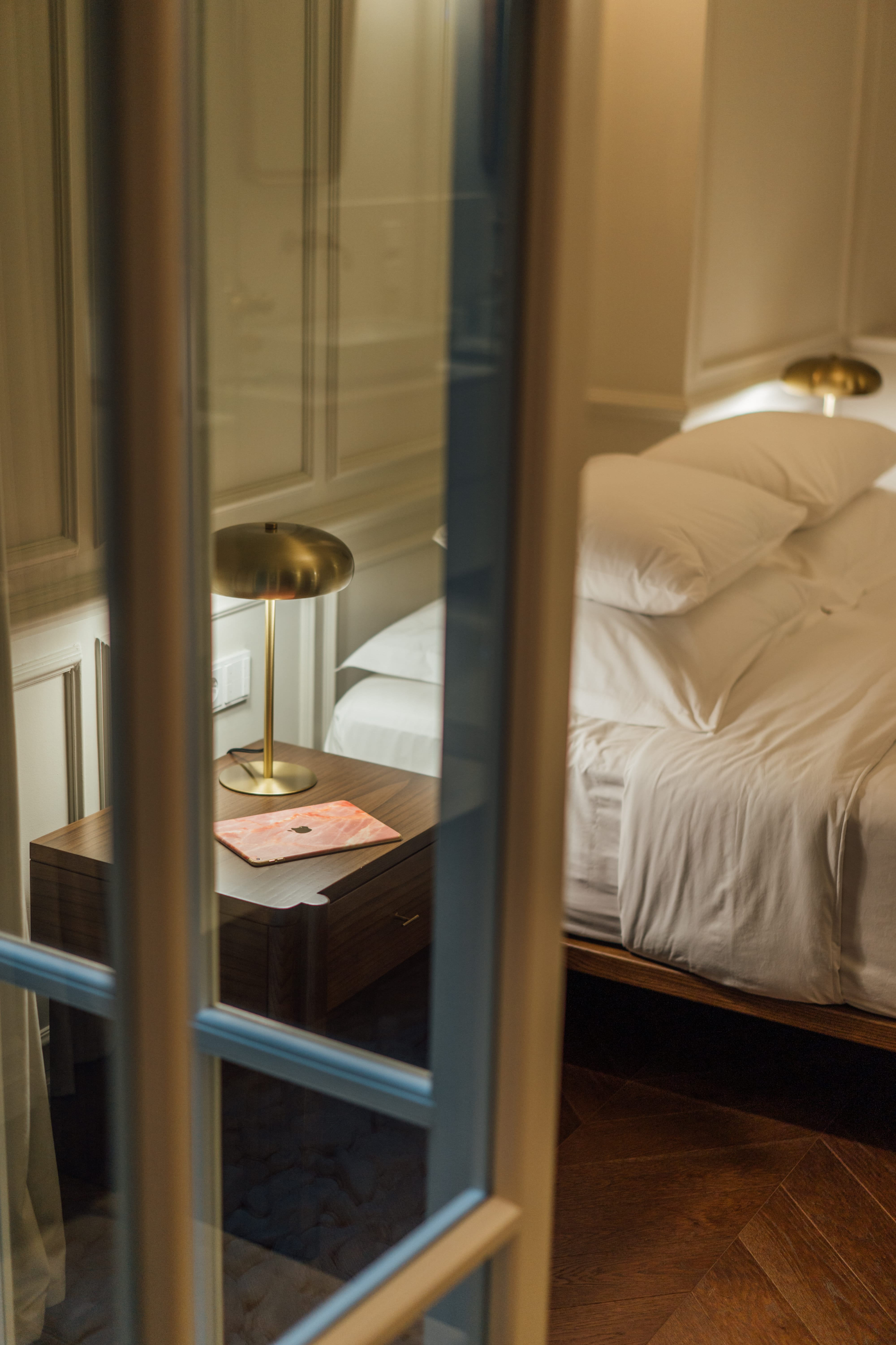 a bedroom with a glass door