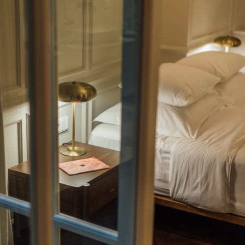 a bedroom with a glass door