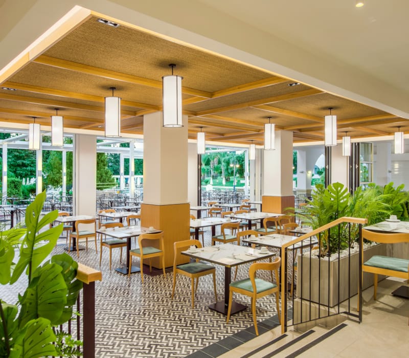 a room with tables and chairs