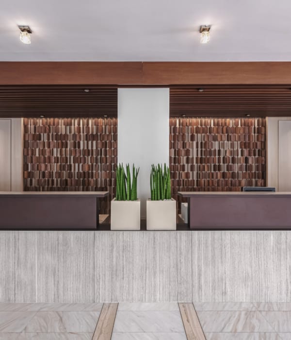 a room with a counter and chairs