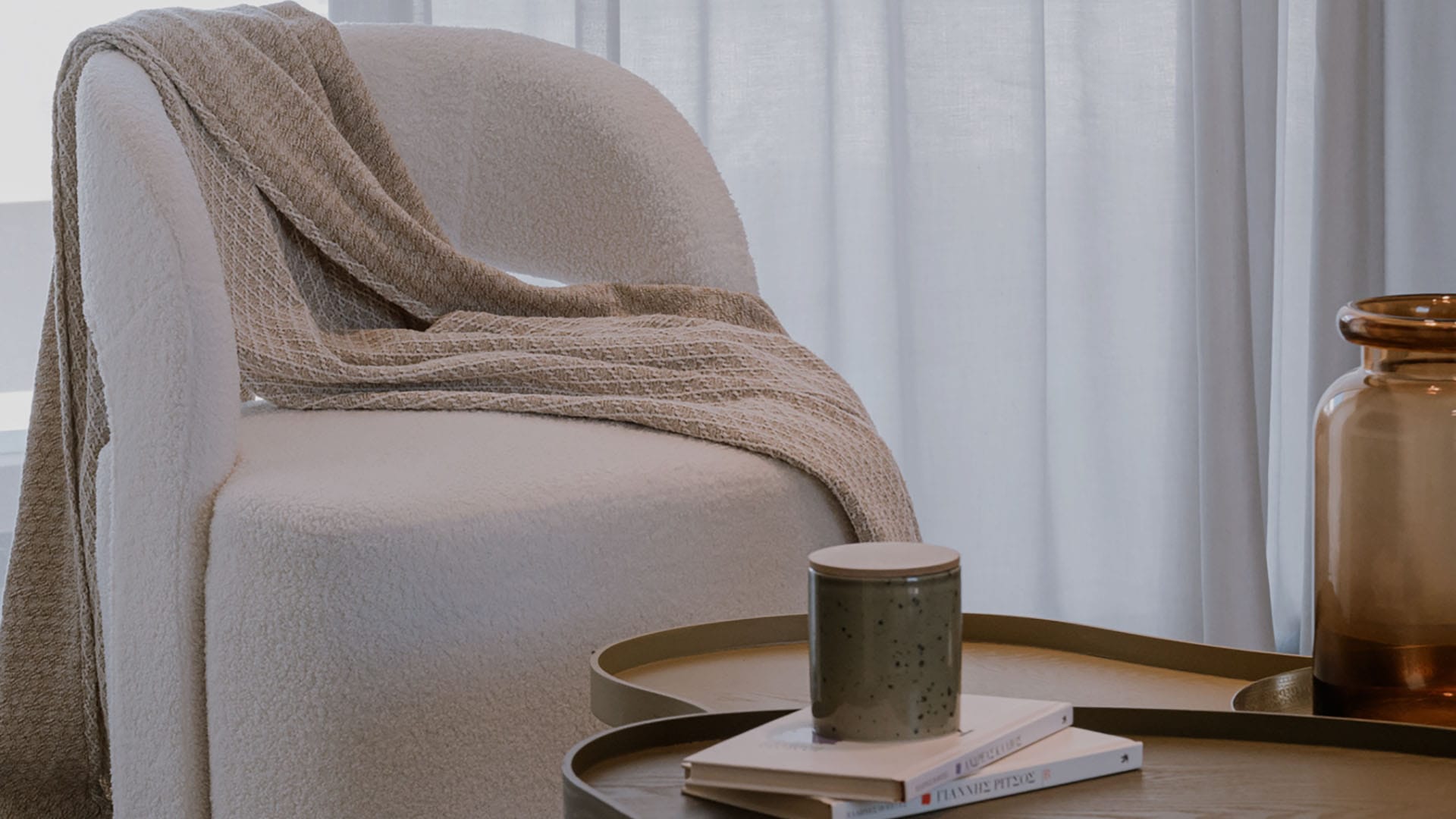 a white couch with a white pillow