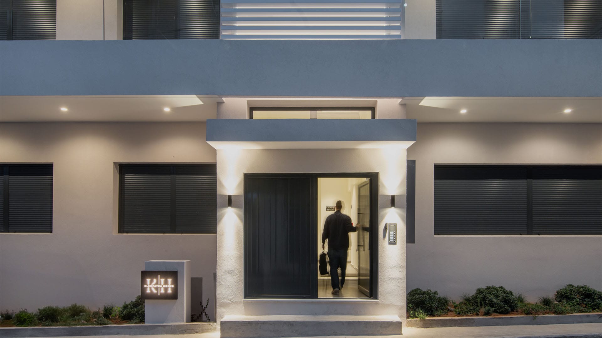 a person walking out of a building