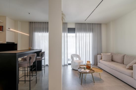 a living room with a couch and a table