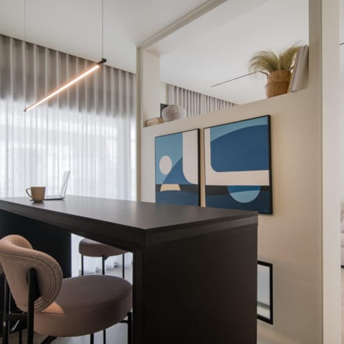 a room with a table and chairs