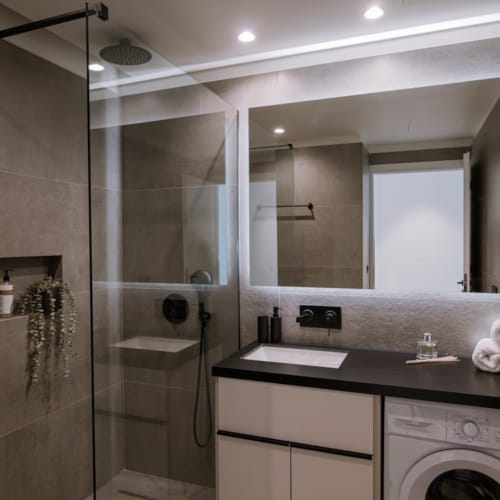 a bathroom with a glass shower