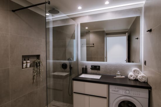 a bathroom with a glass shower