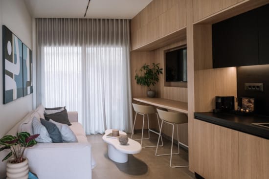 a living room with a couch and a table