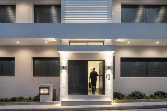 a person walking out of a building