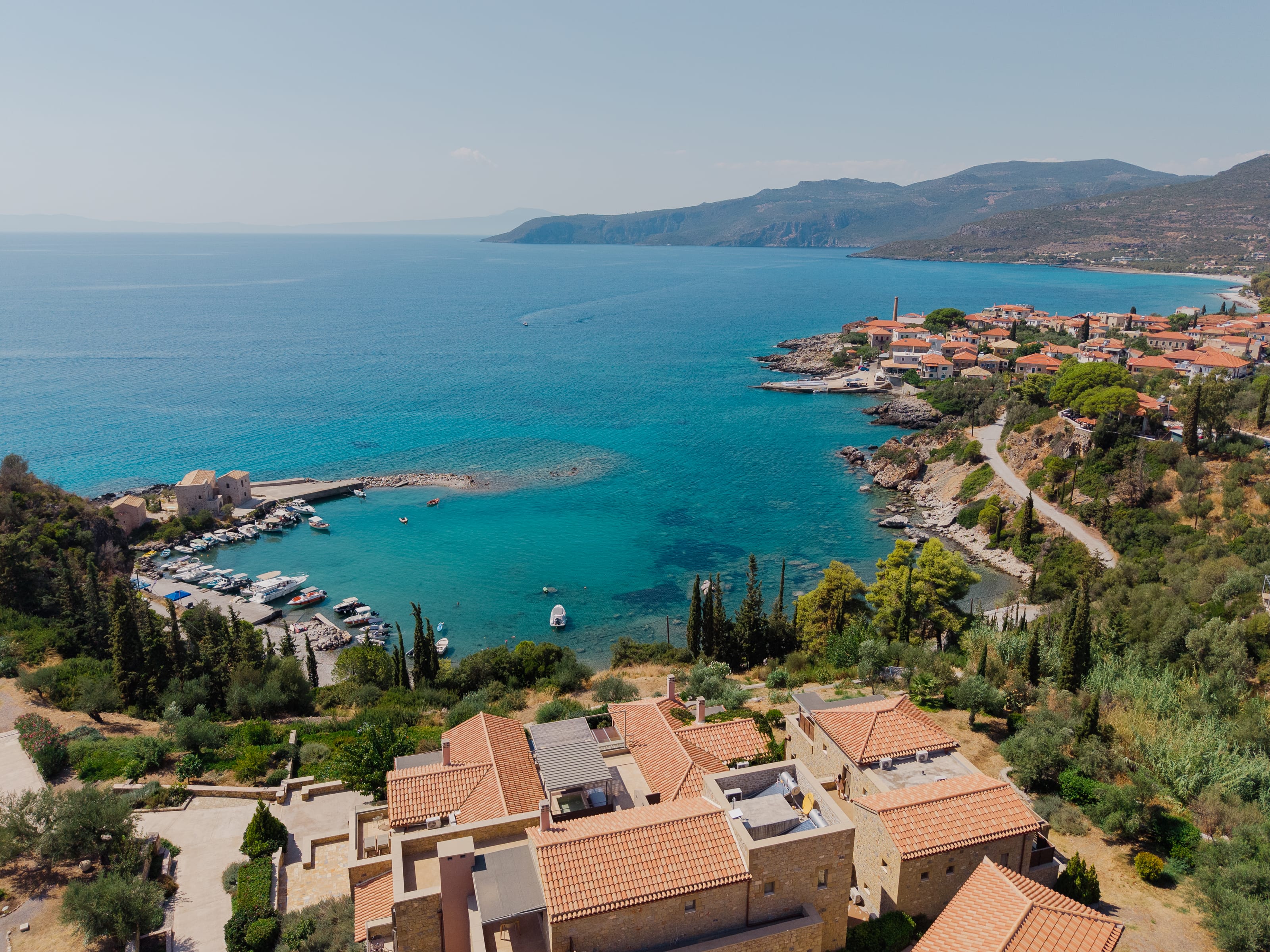 a high angle view of a town by the sea