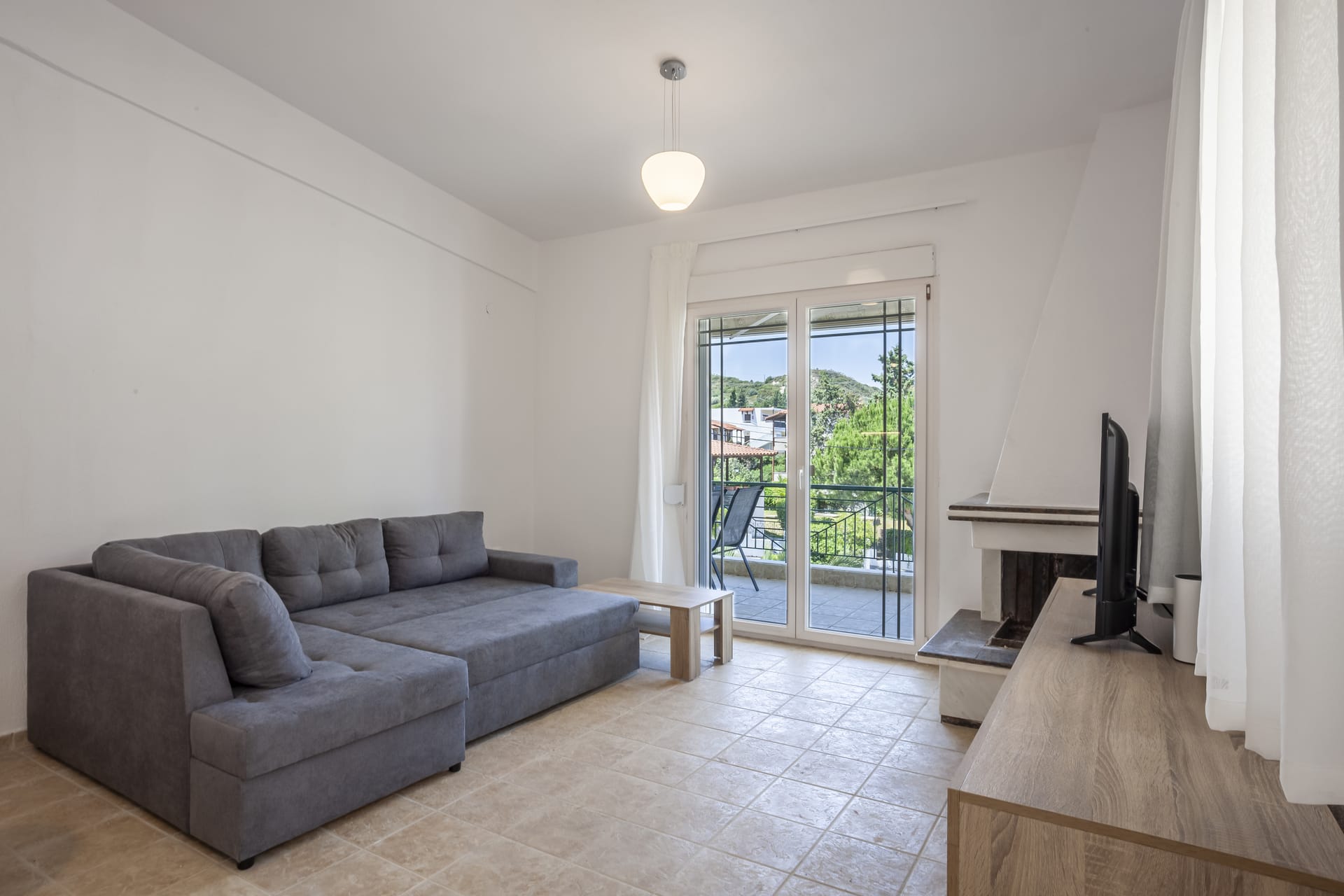 a living room with a couch and a table
