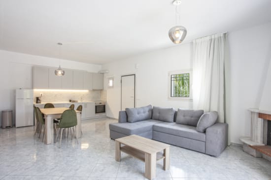 a living room with a couch and a table