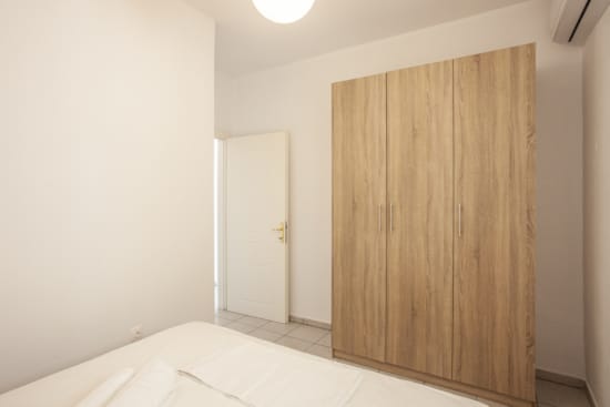 a room with a door and a window