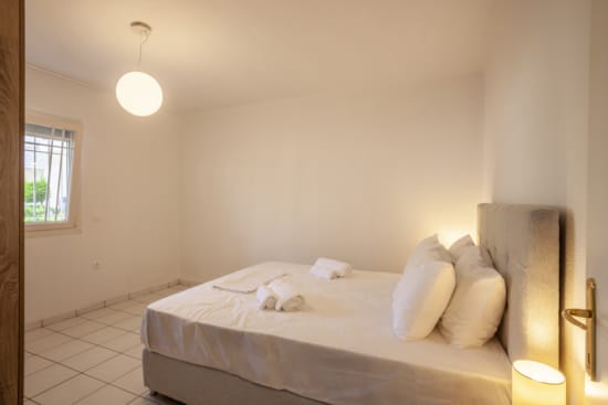 a bed with white sheets