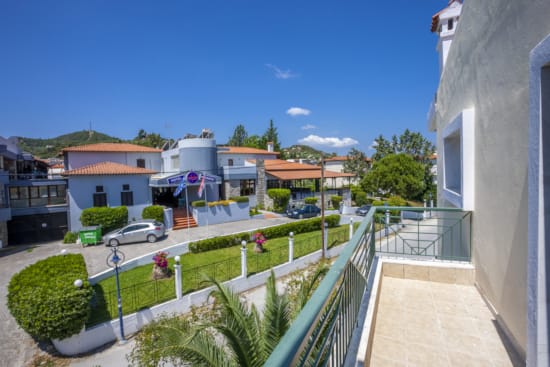 a street with houses and trees
