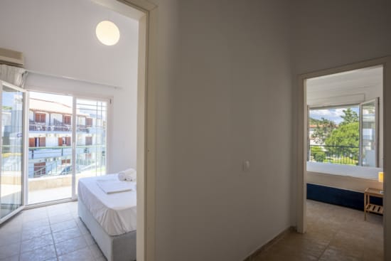 a bathroom with a tub and toilet