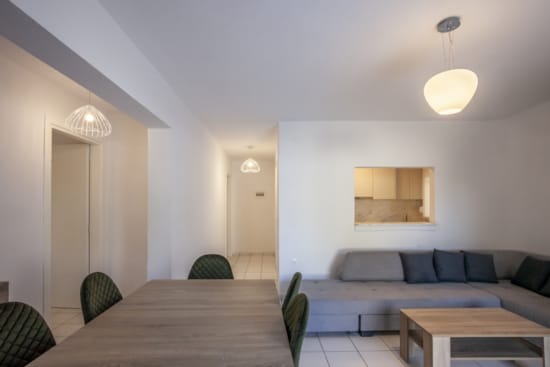 a room with a couch and a table