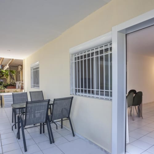 a room with chairs and tables