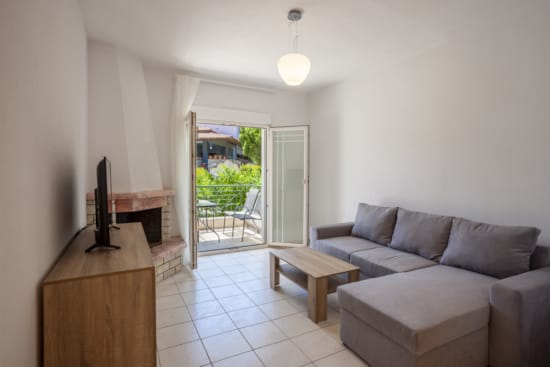a living room with a couch and a table