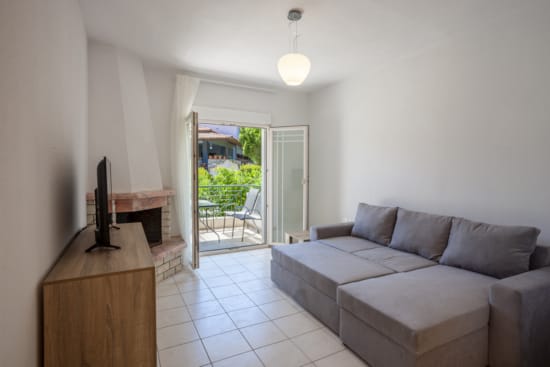 a living room with a couch and a table