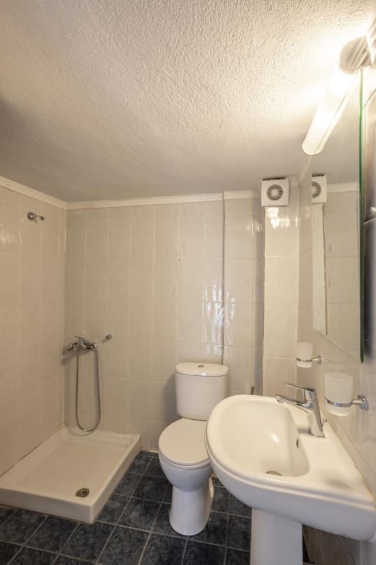 a bathroom with a toilet sink and a bathtub