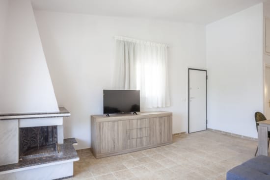 a living room with a fireplace