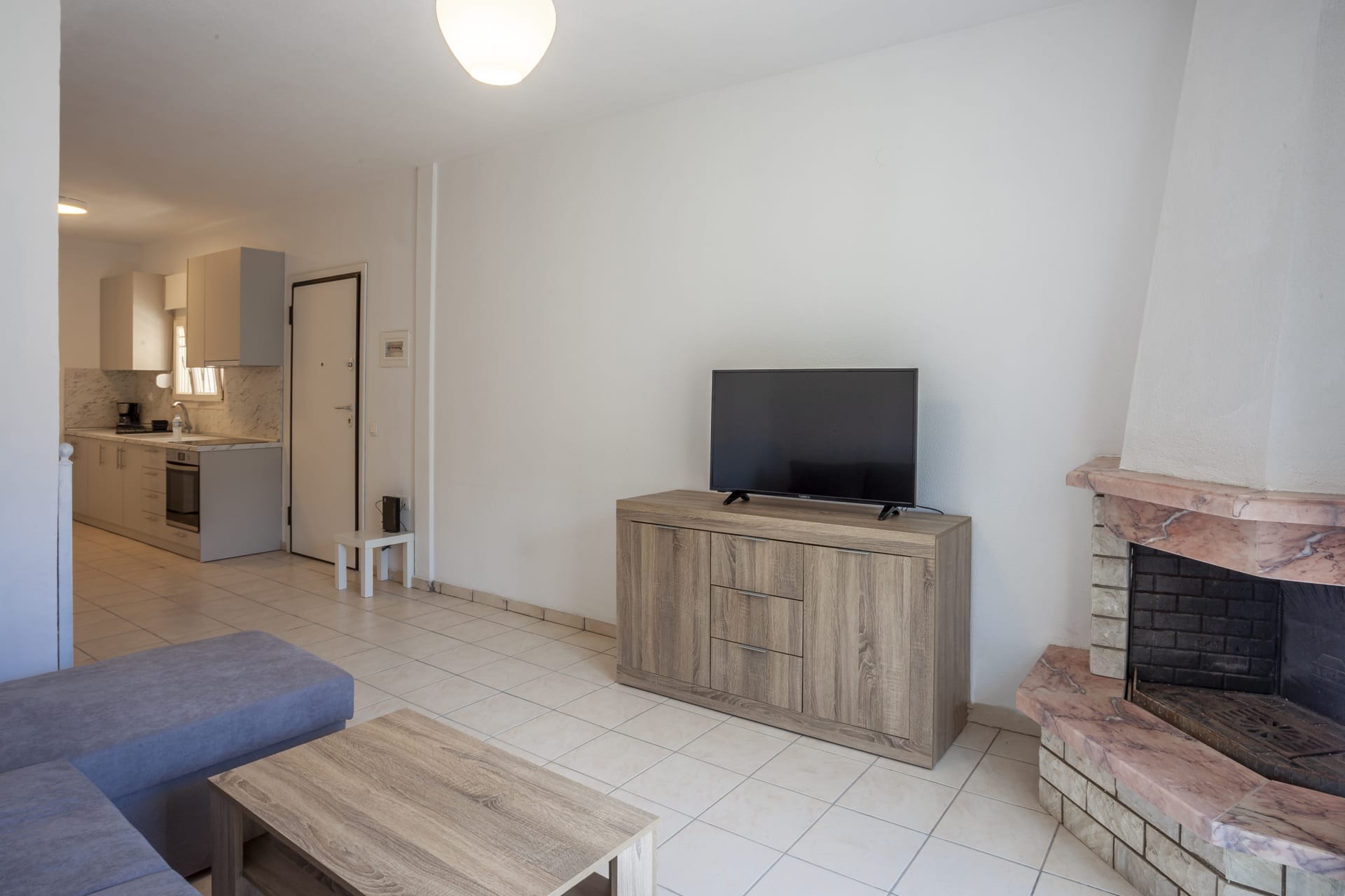 a living room with a fireplace