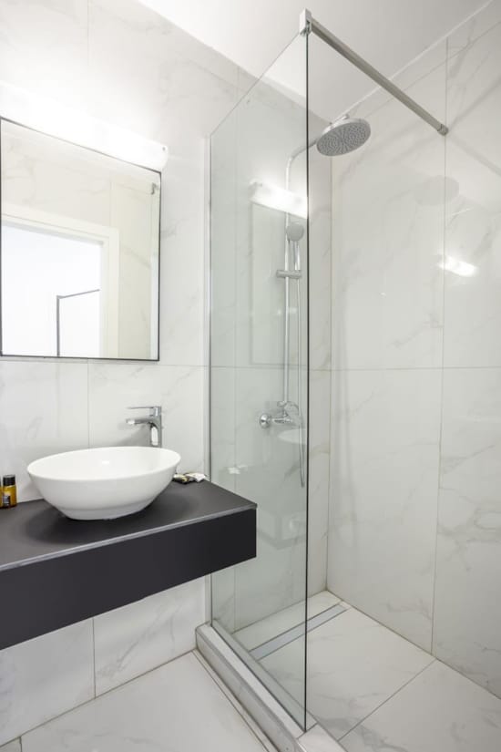 a bathroom with a glass shower