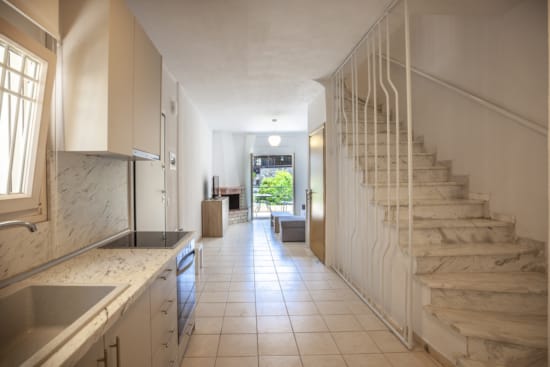 a long white hallway with white walls