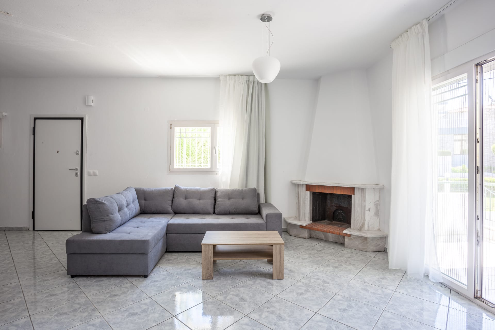 a living room with a fireplace