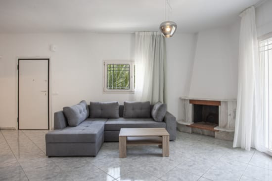 a living room with a fireplace