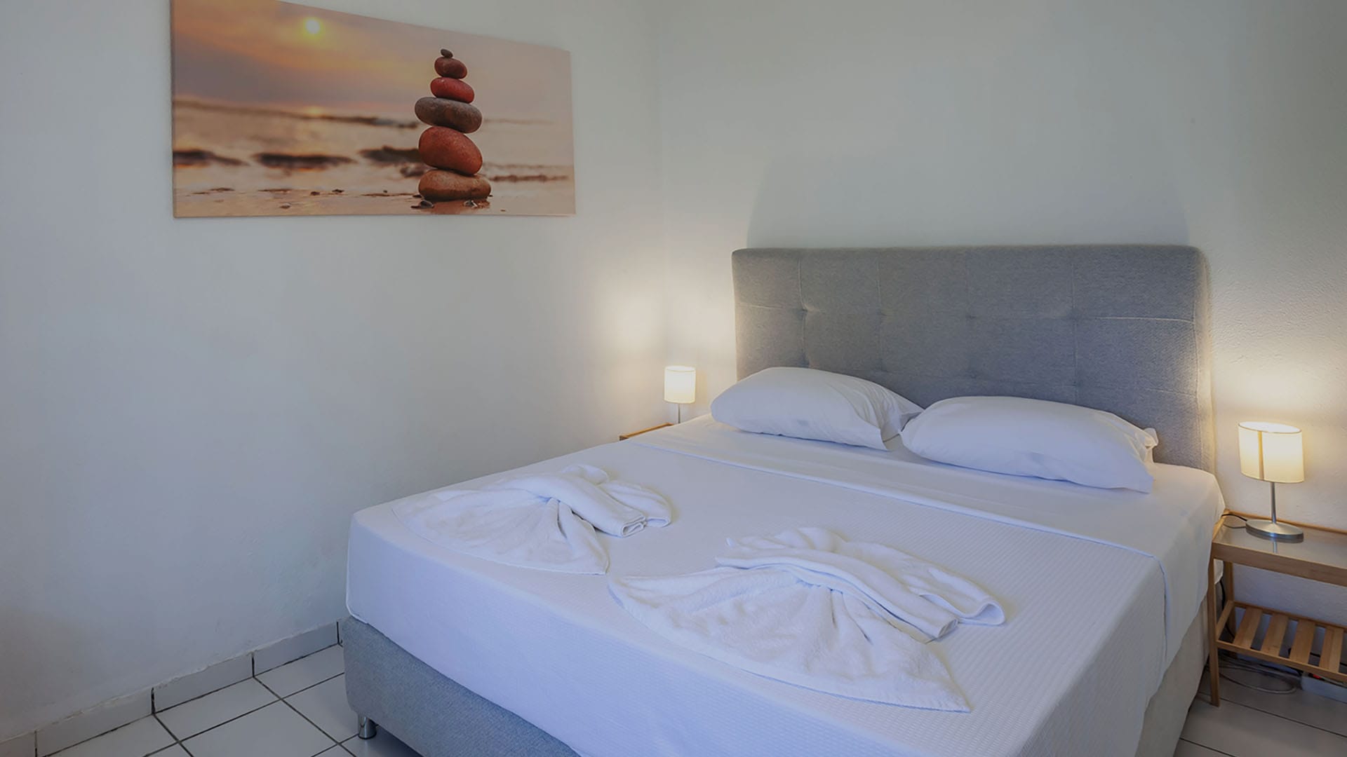 a bed with a white sheet