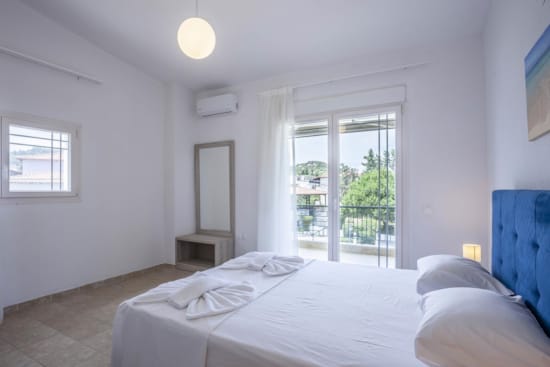 a bedroom with two beds