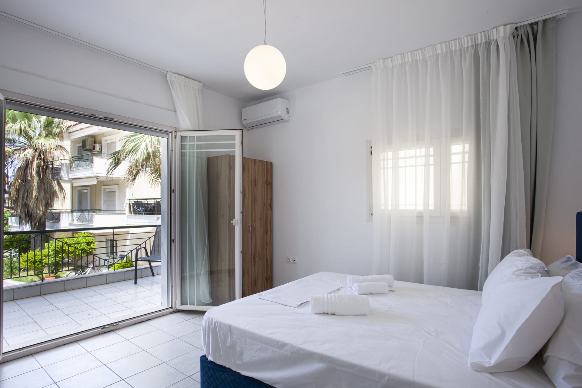 a room with a bed and a window