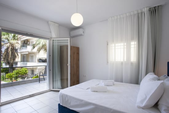 a room with a bed and a window