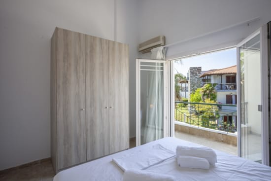 a bed with a white sheet