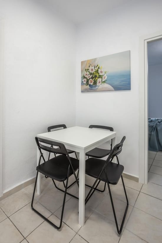 a table and chairs in a room
