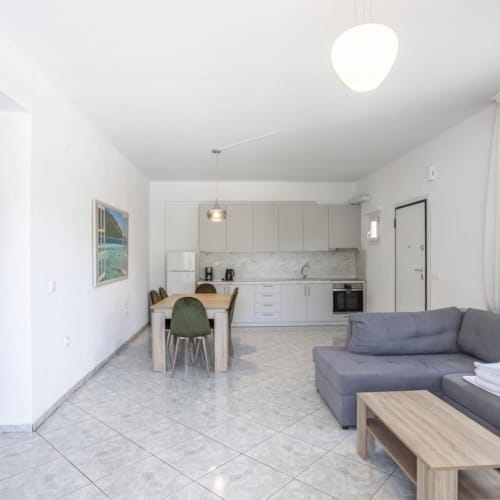 a living room with a couch and a table