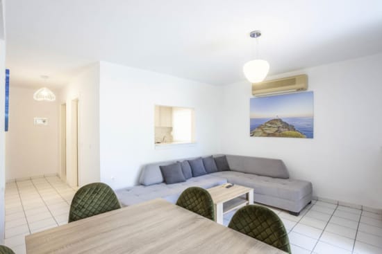 a living room with a couch and a table