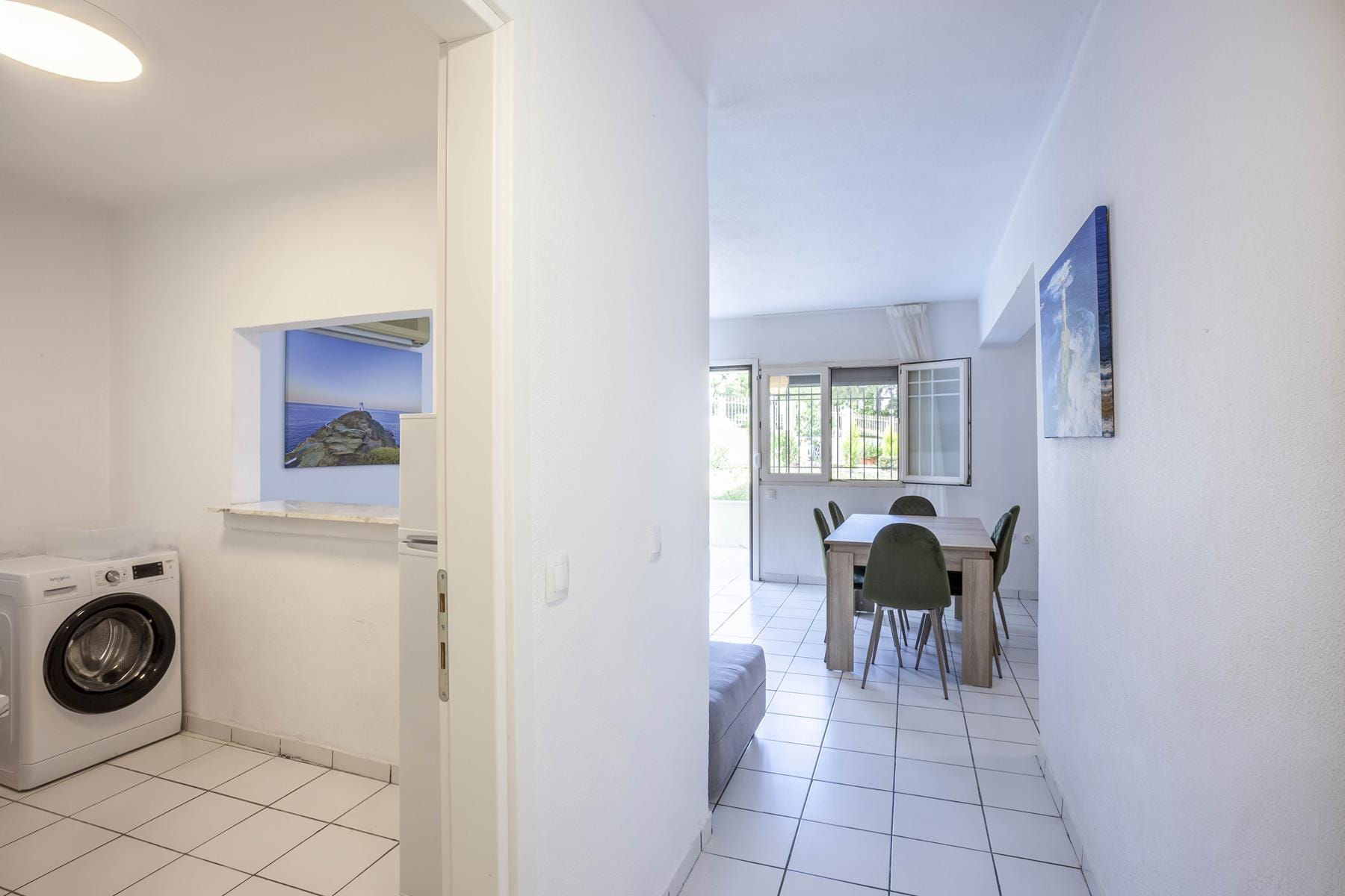 a room with a table and chairs