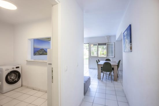 a room with a table and chairs