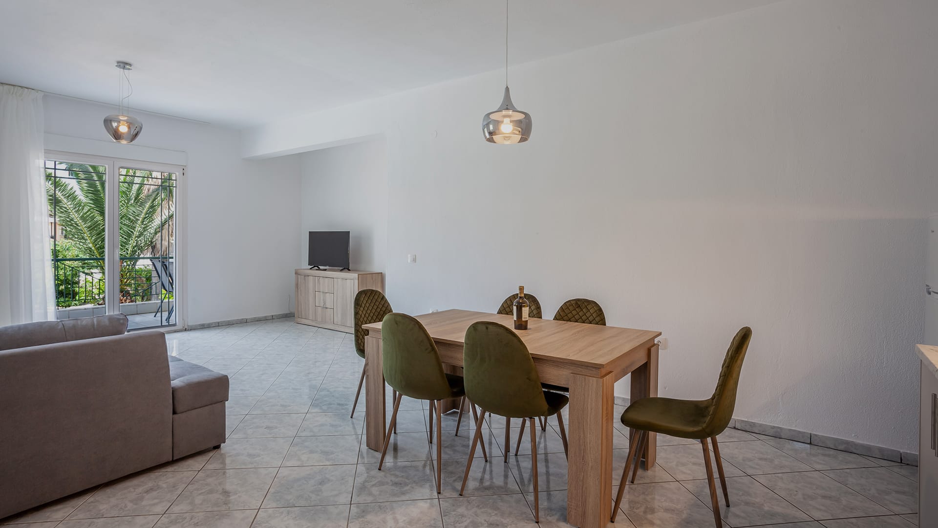 a room with a table and chairs