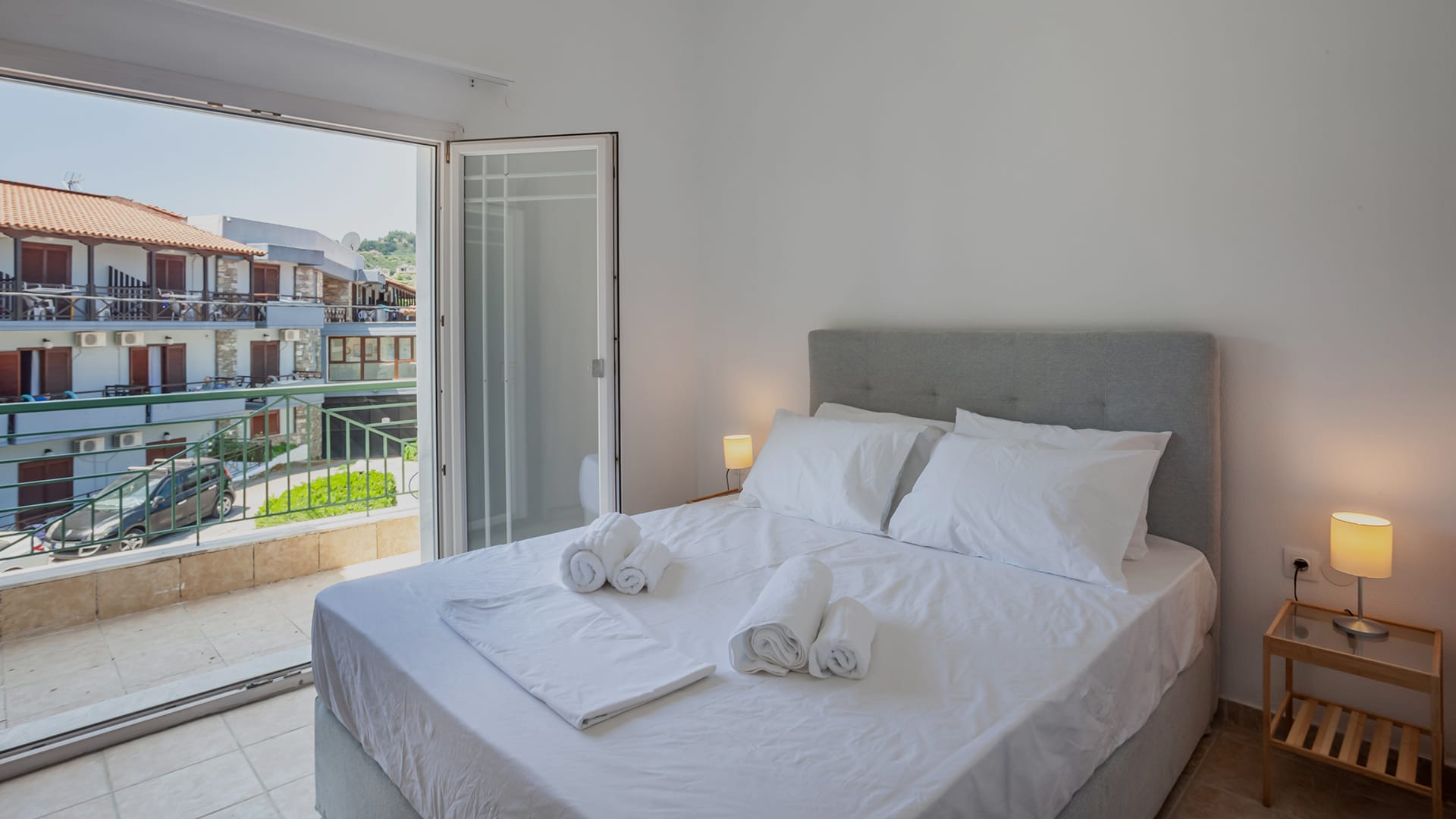 a bed with white sheets