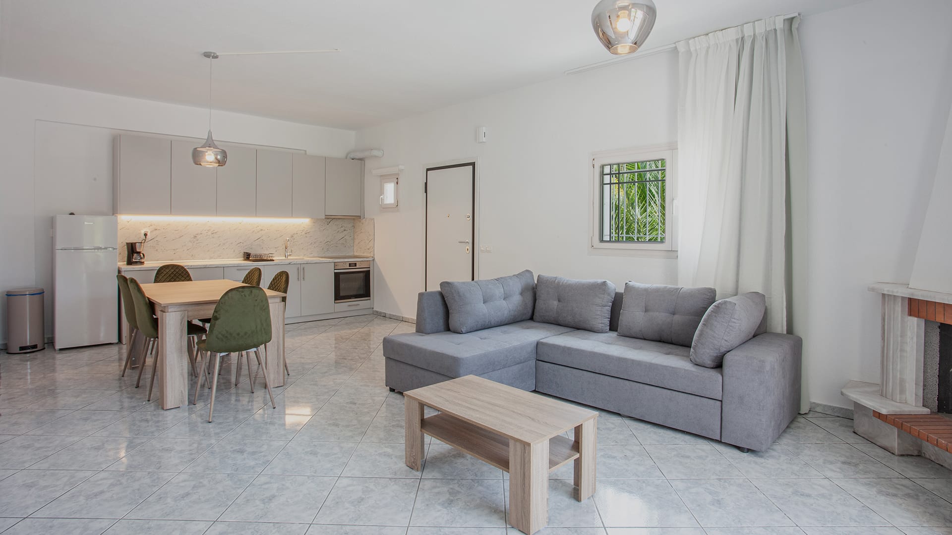 a living room with a couch and a table