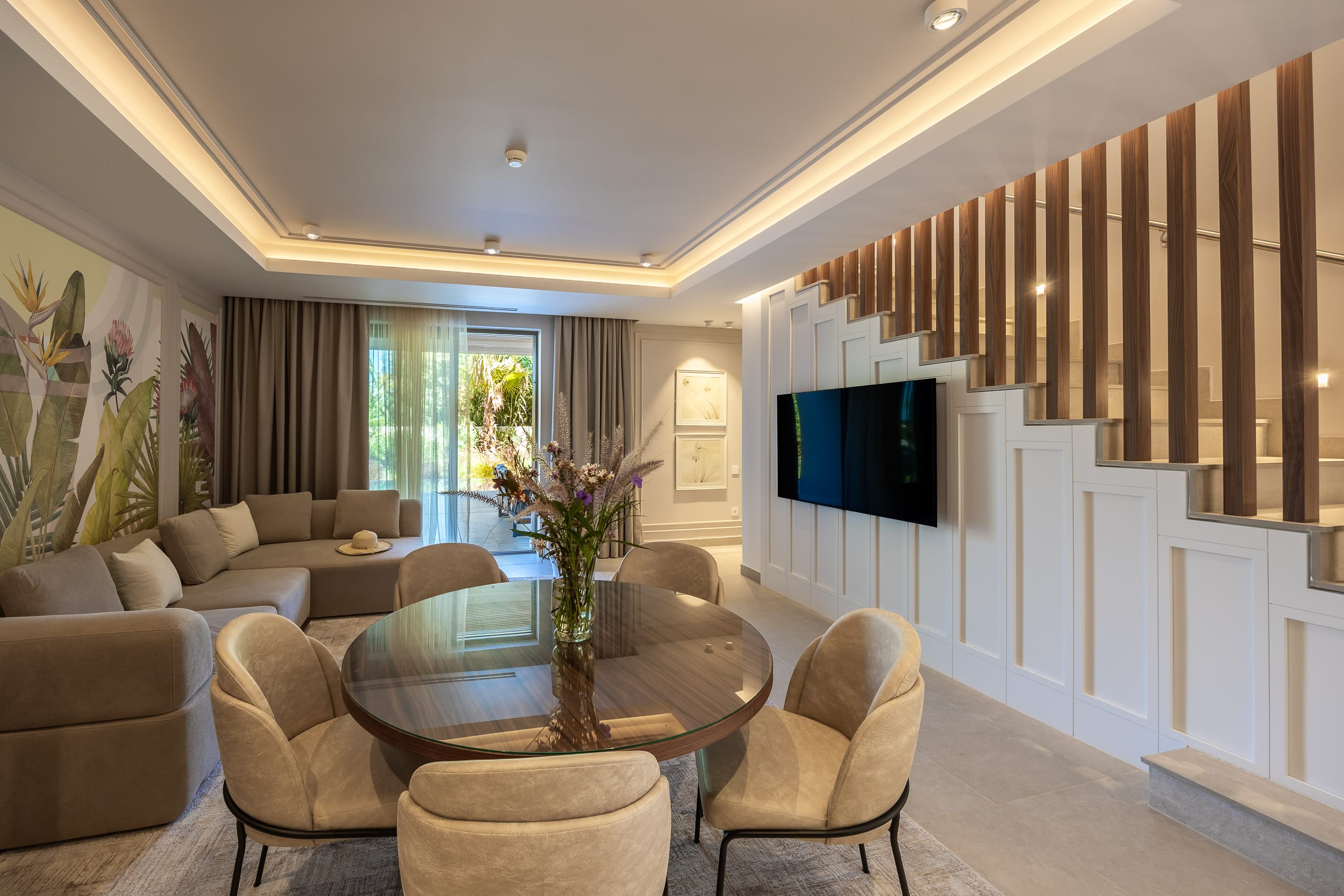 a living room with a large staircase