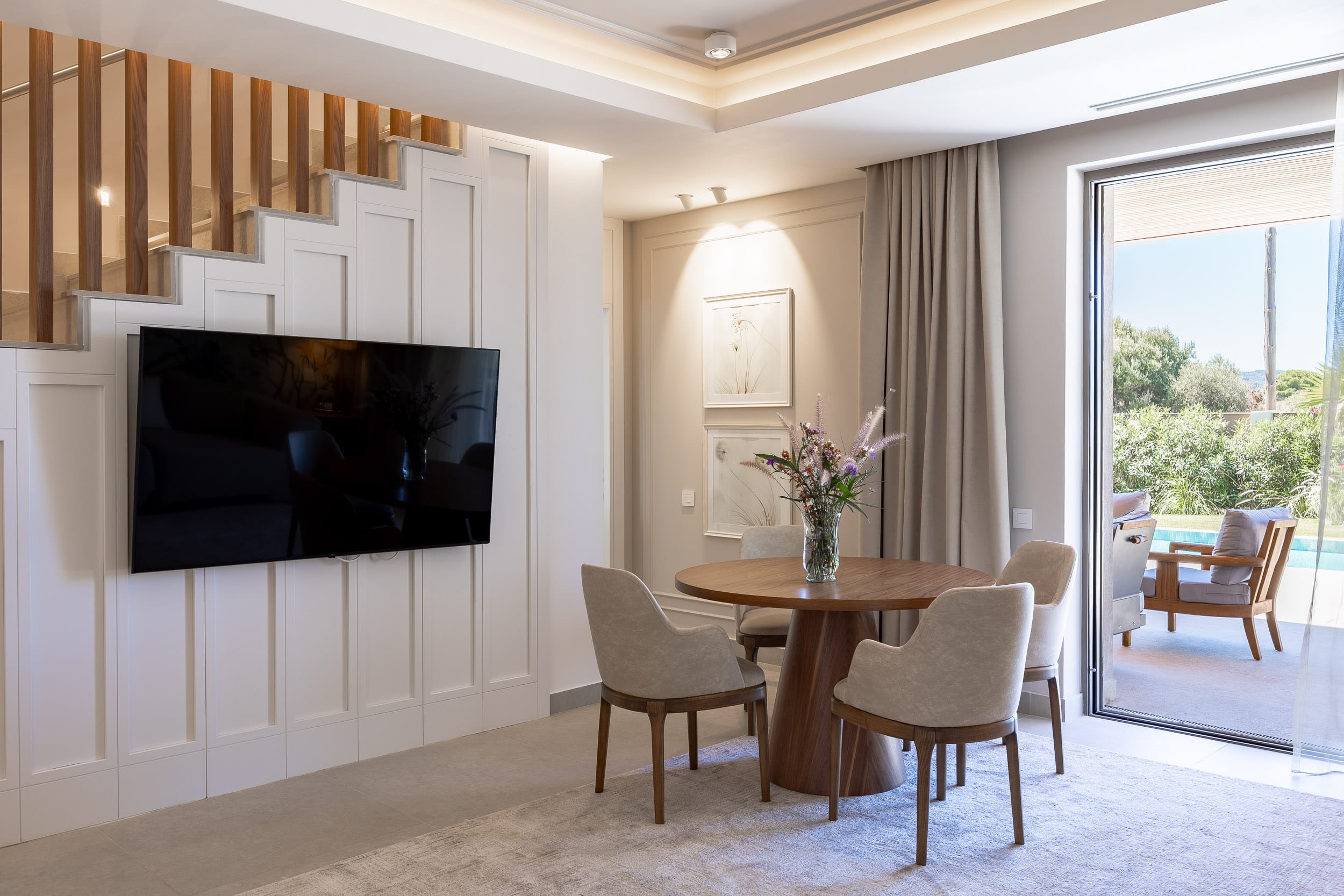 a room with a table and chairs