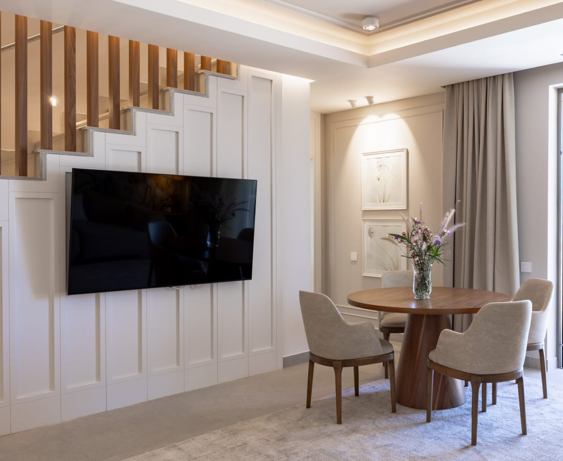 a room with a table and chairs